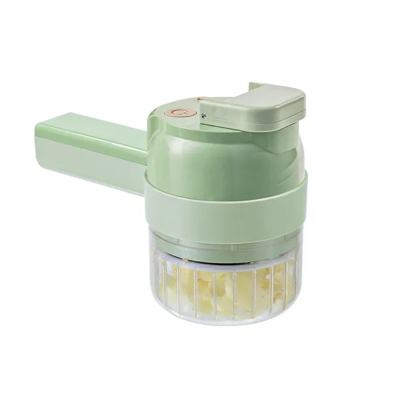 Cortadora de Vegetales Multifunciona portatil en color verde, herramienta eficiente para picar verduras.