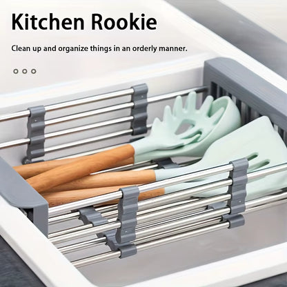 Escurridor Extensible de Acero Inoxidable para Fregadero con utensilios de cocina organizados.