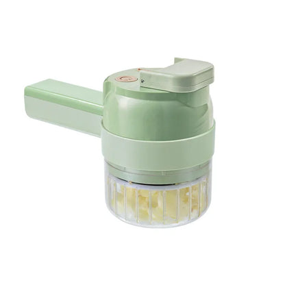 Cortadora de Vegetales Multifunciona portatil en color verde, herramienta eficiente para picar verduras.